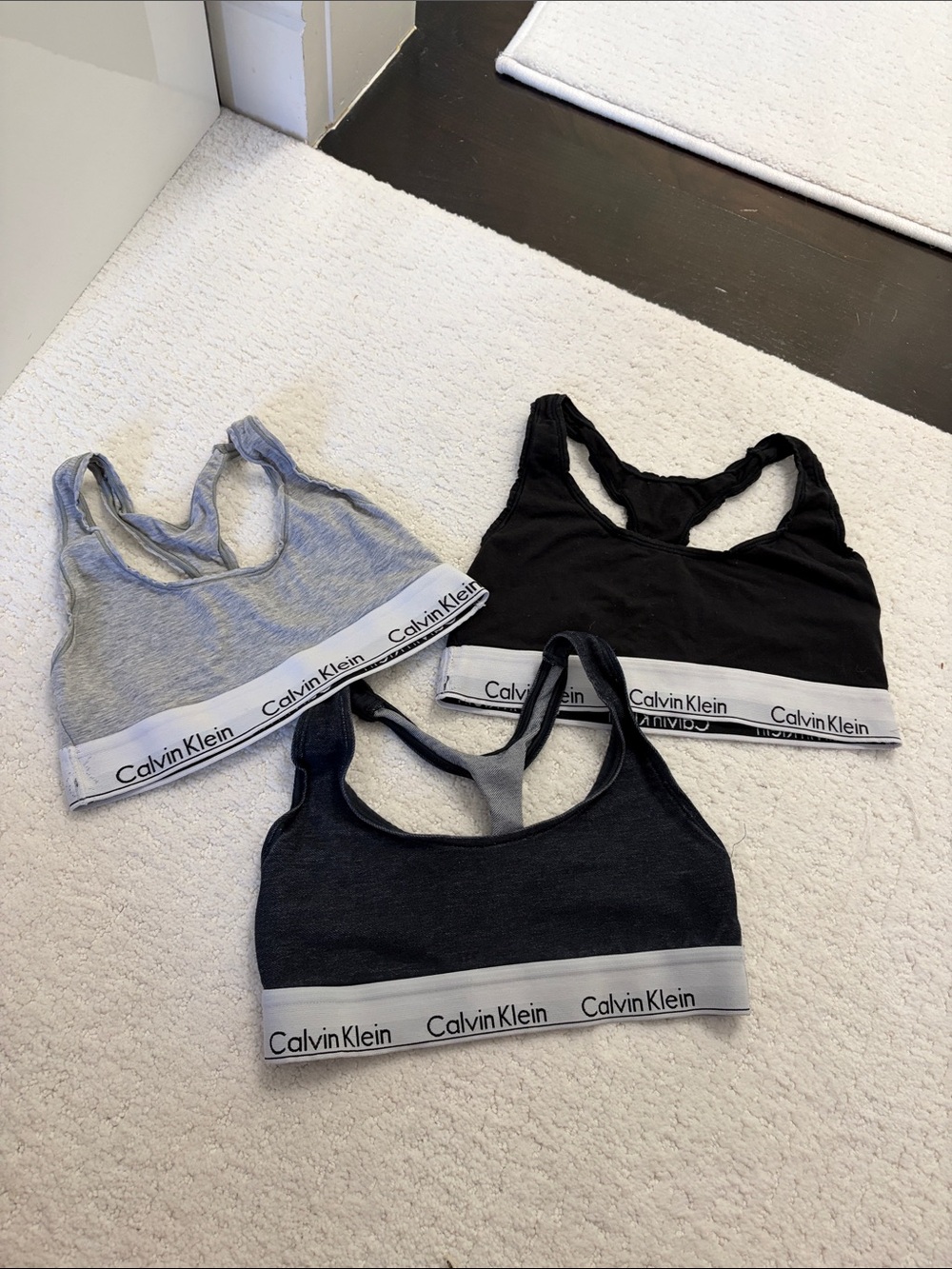 Calvin Klein 3-Pack Racerback Bralettes in Black, Charcoal, and Light Gray